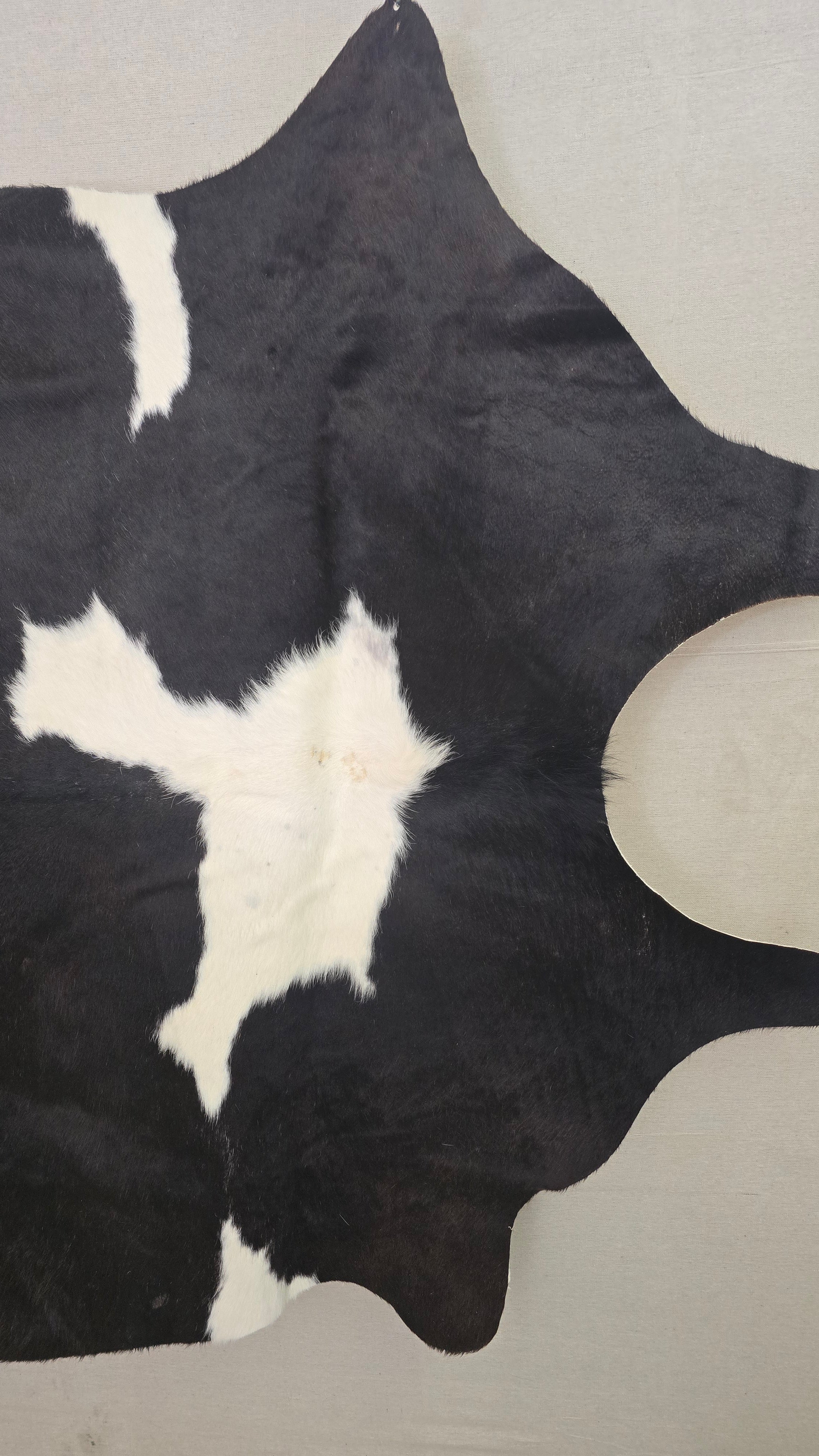 Eccentric Black and White Cowhide Rug Handcrafted in Argentina