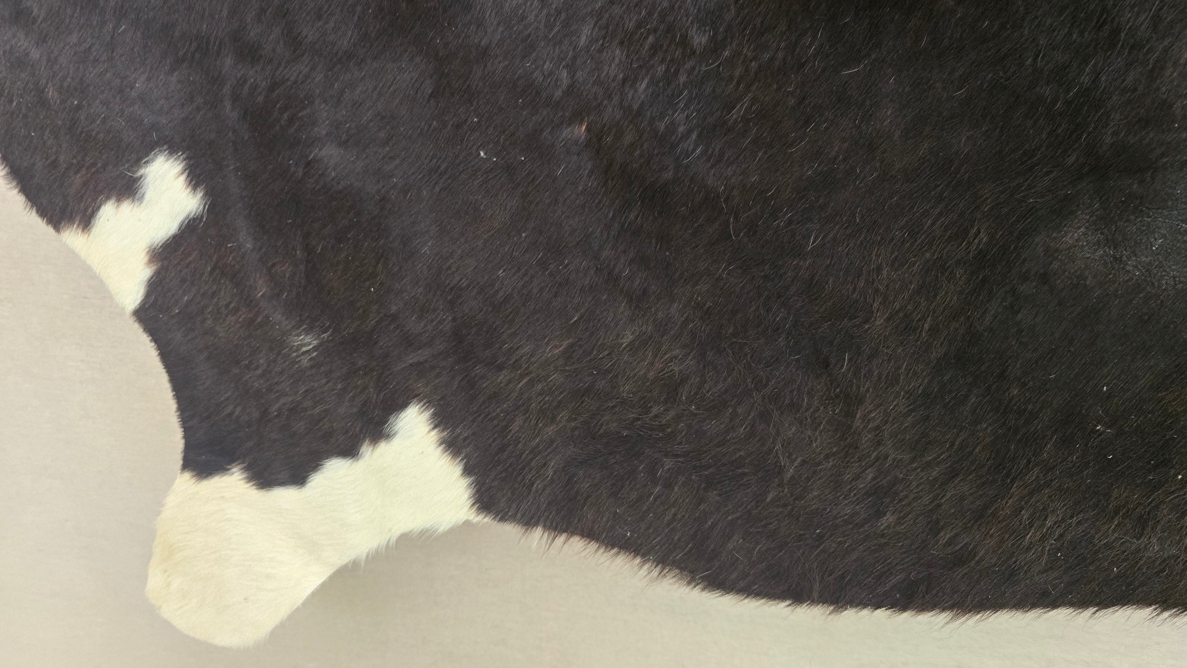 Eccentric Black and White Cowhide Rug Handcrafted in Argentina