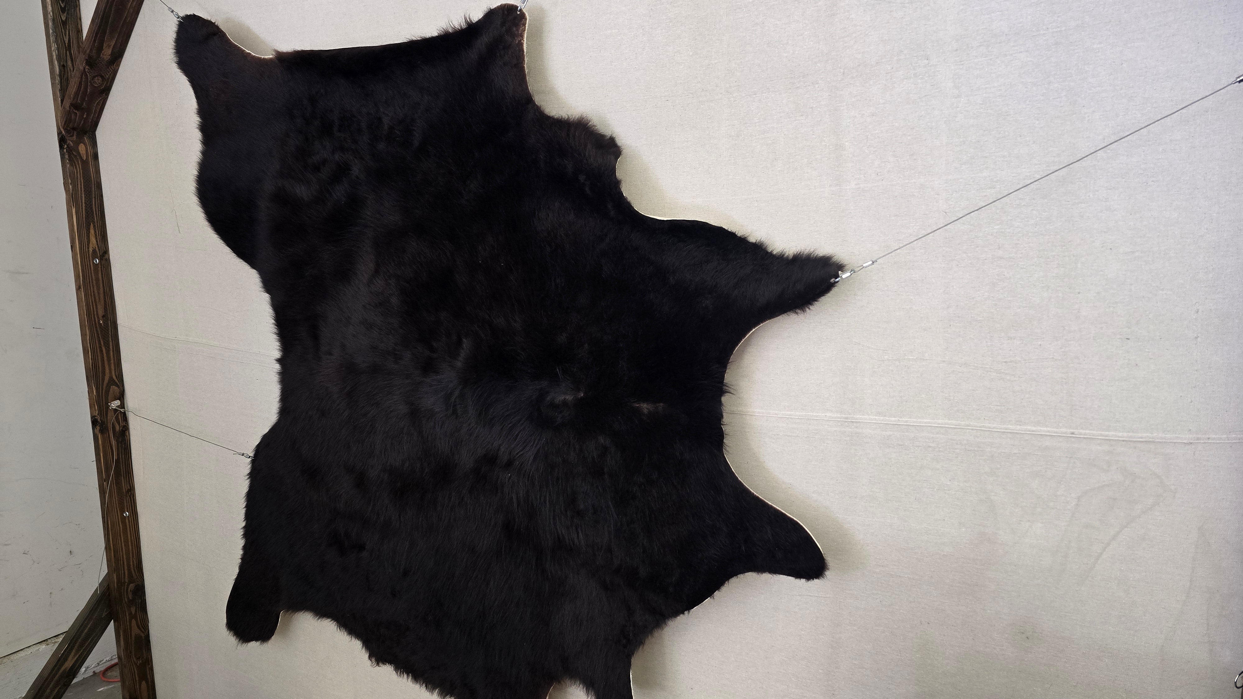 Sophisticated Black Cowhide Rug Handmade in Argentina