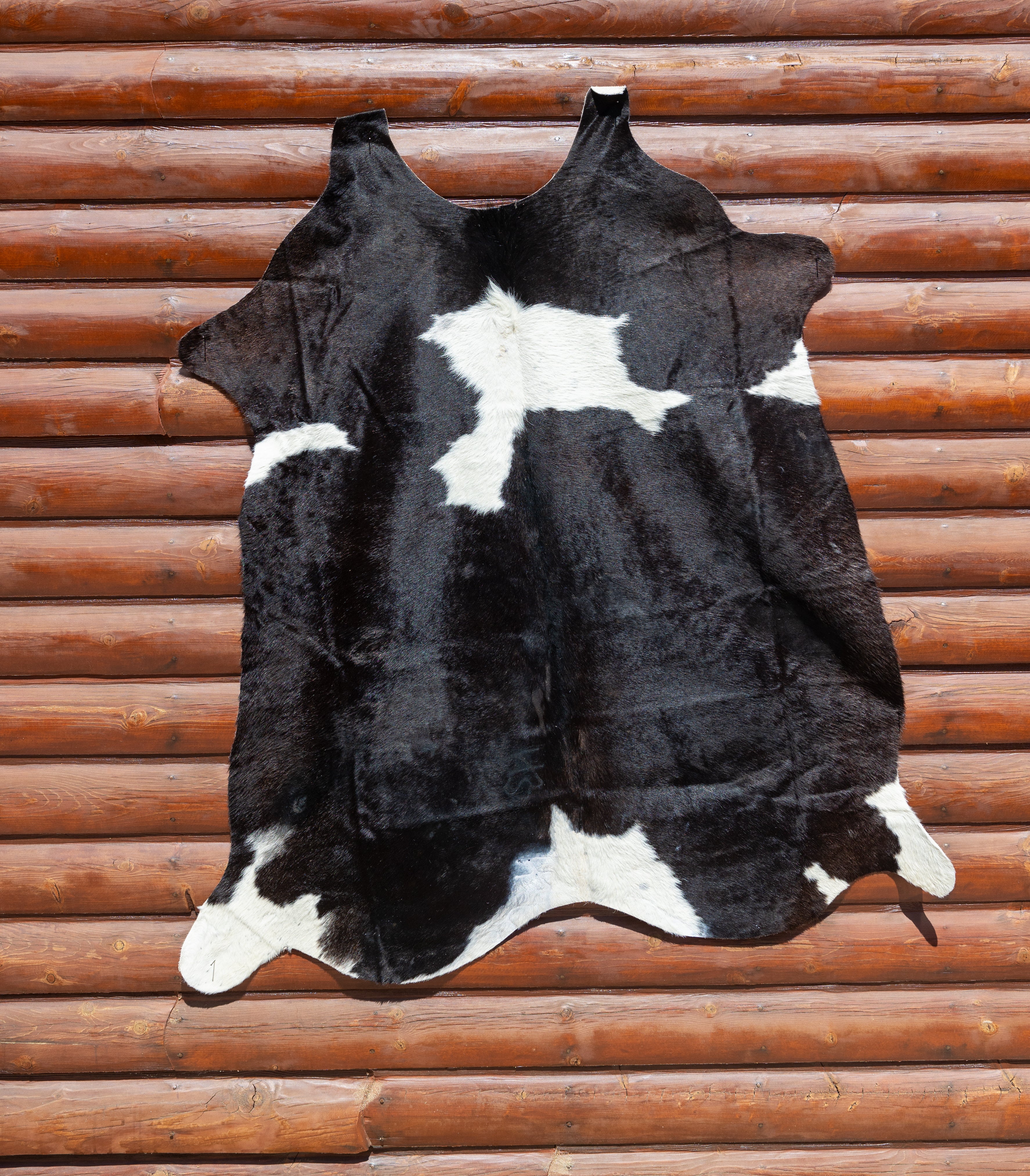 Eccentric Black and White Cowhide Rug Handcrafted in Argentina