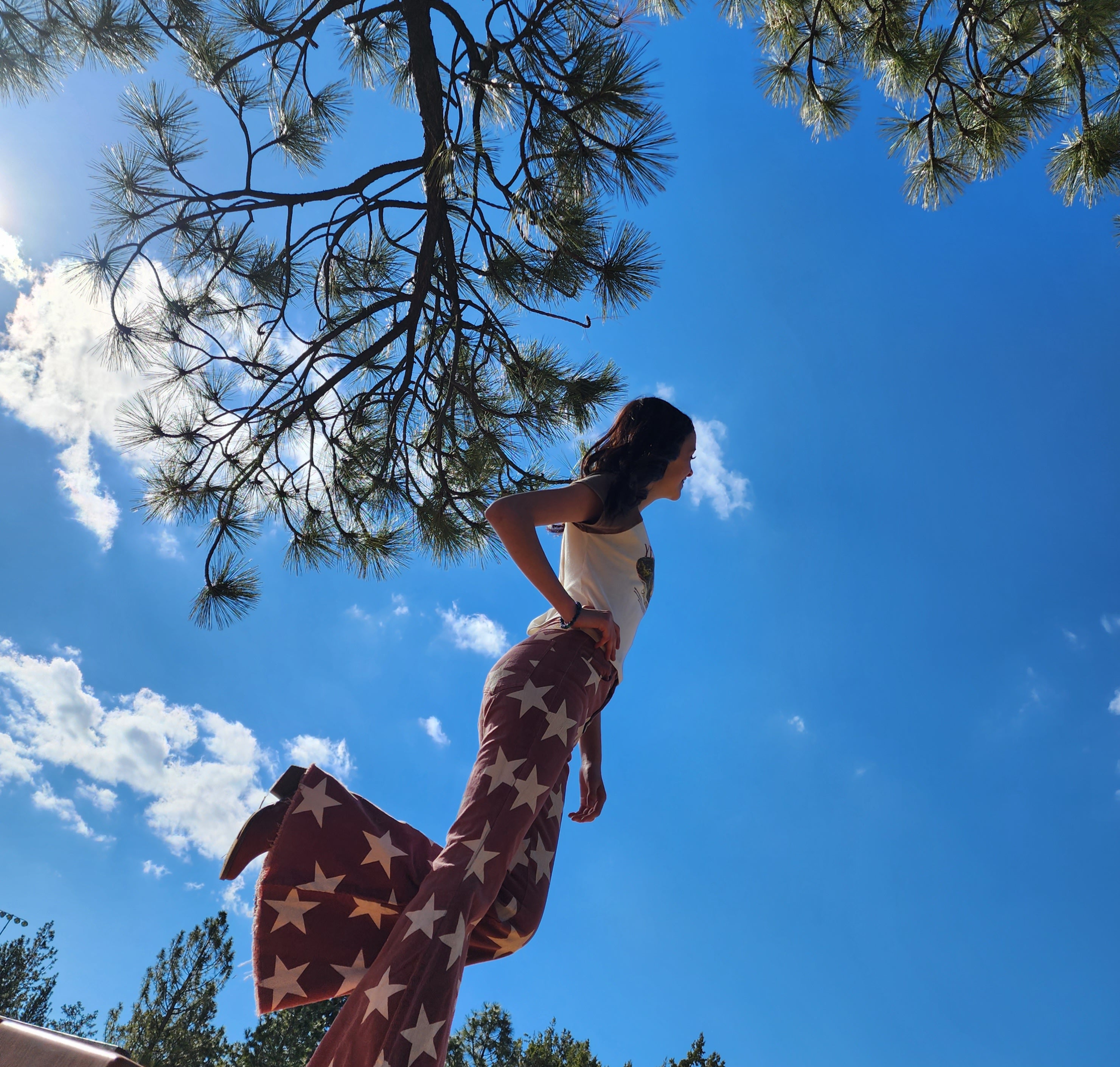 Altar'd State Red and White Stars Bell Bottom Jeans.