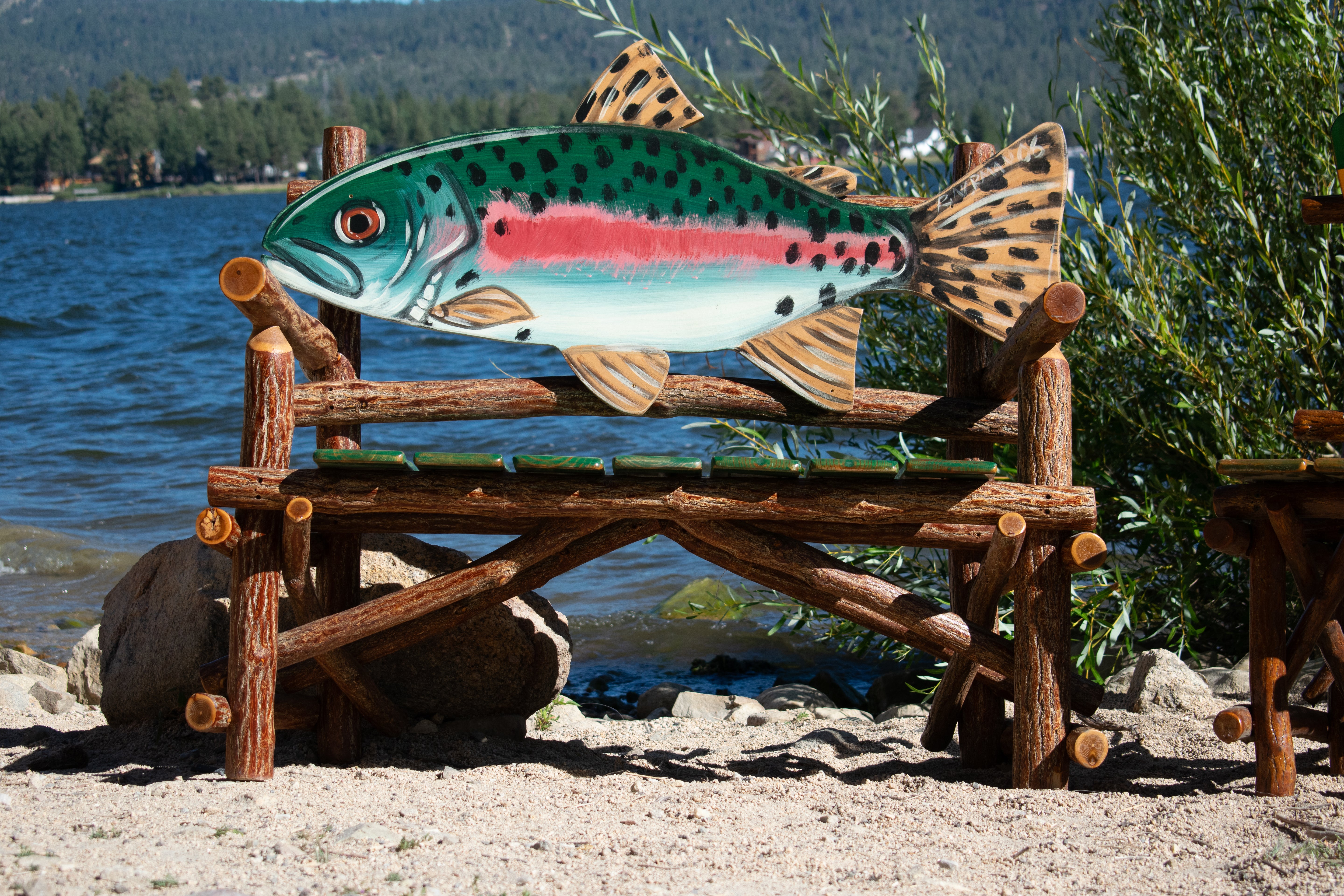 Natural Log Fish Bench Depicting a Realistic Rainbow Trout
