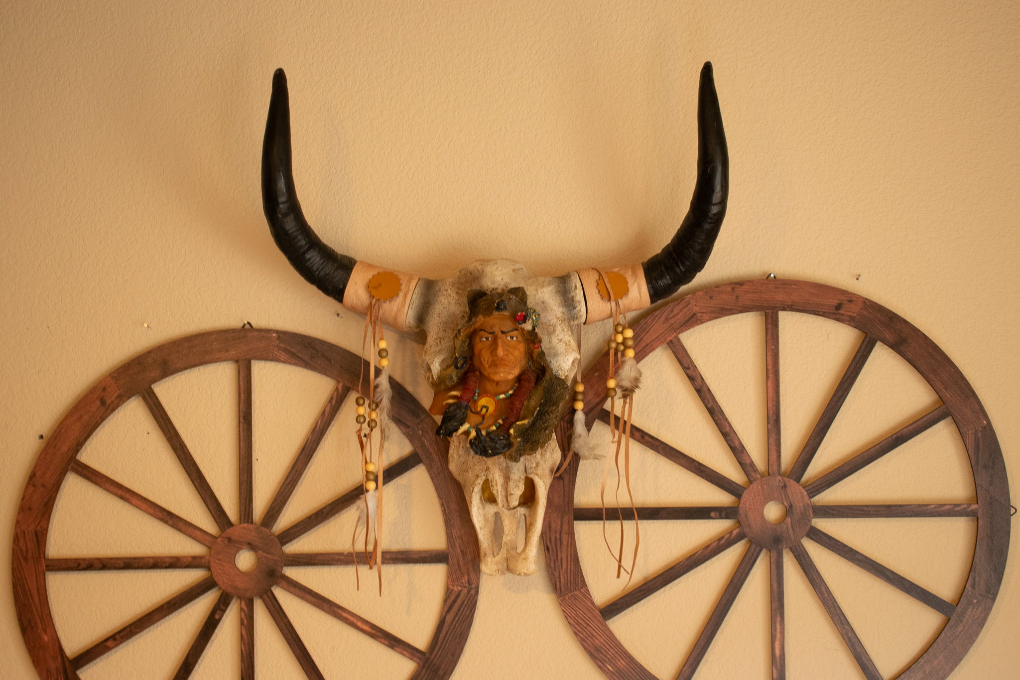 "Native Indian Chief on Ceramic Cattle Skull – Detailed Wolf Skin Forehead Sculpture"