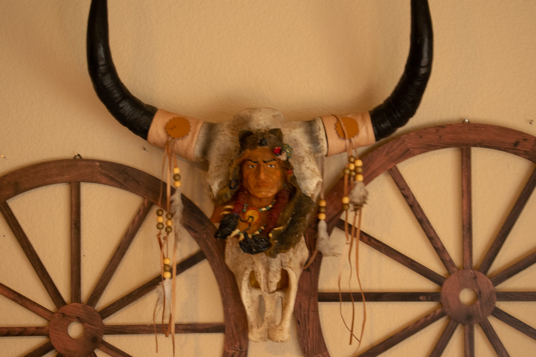 "Native Indian Chief on Ceramic Cattle Skull – Detailed Wolf Skin Forehead Sculpture"