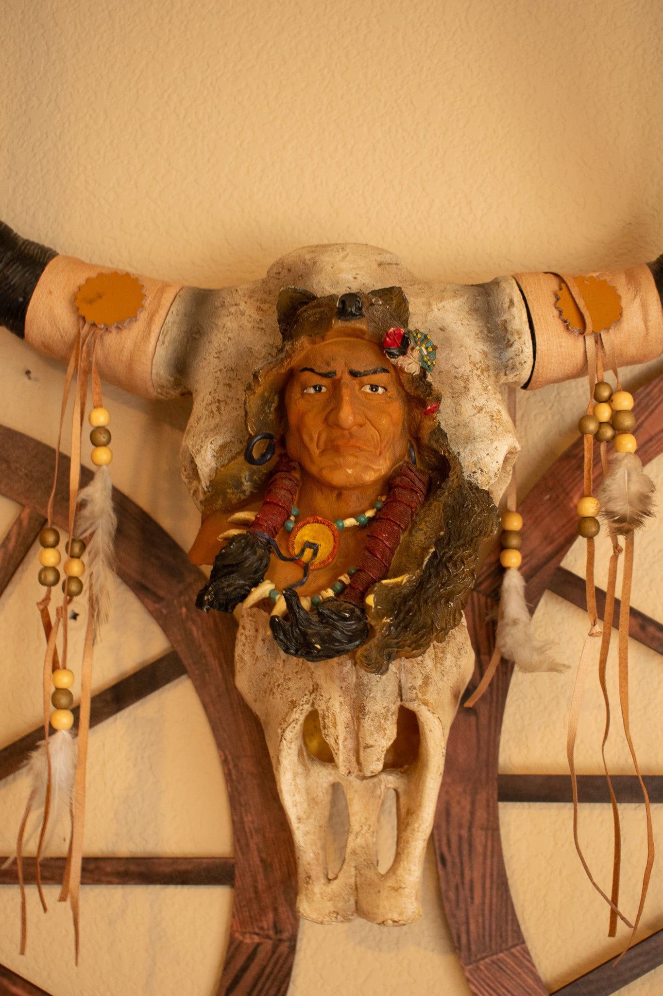 "Native Indian Chief on Ceramic Cattle Skull – Detailed Wolf Skin Forehead Sculpture"