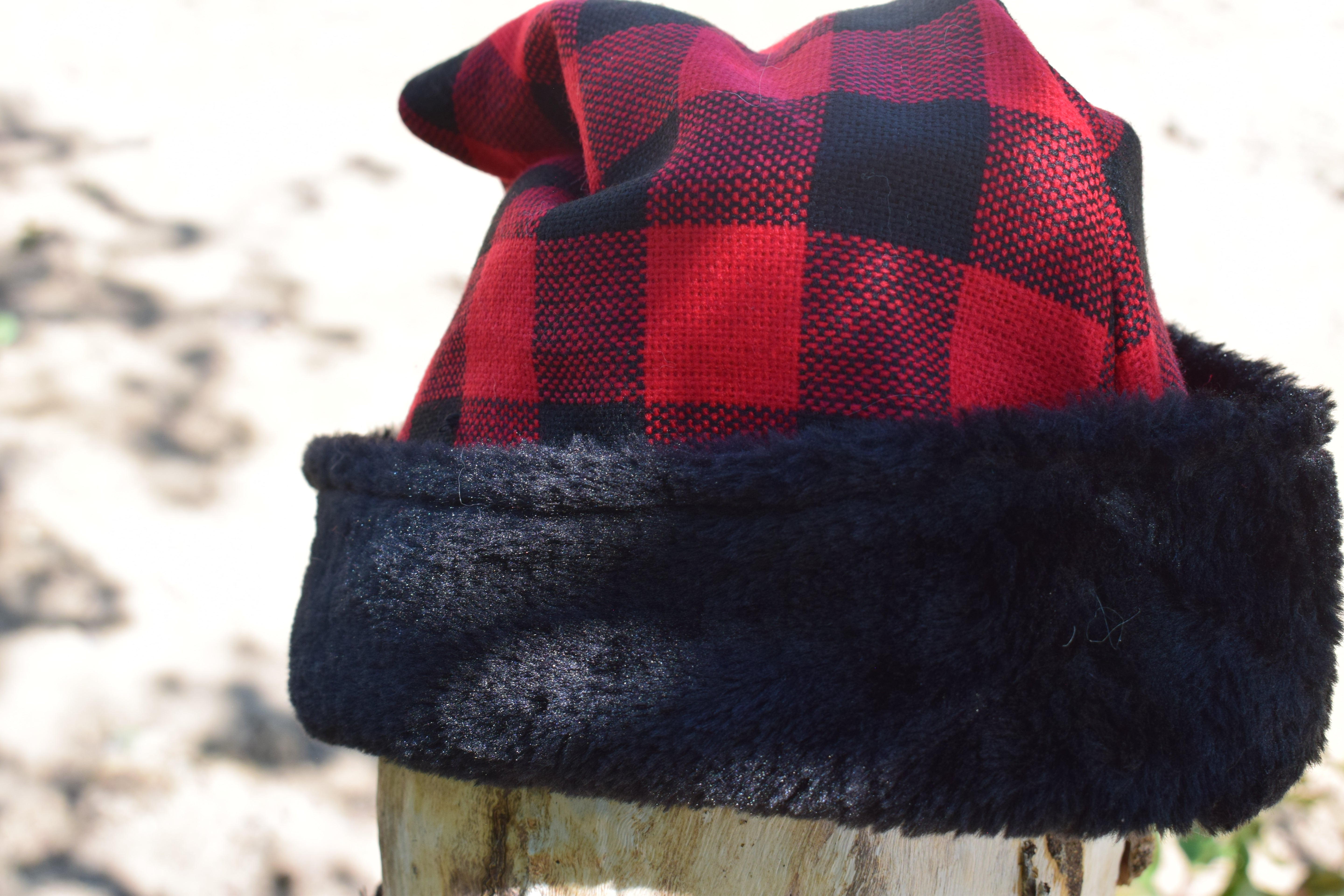 Merry Brite  Red Plaid Santa Hat with black Fluffy Trim Adult Size