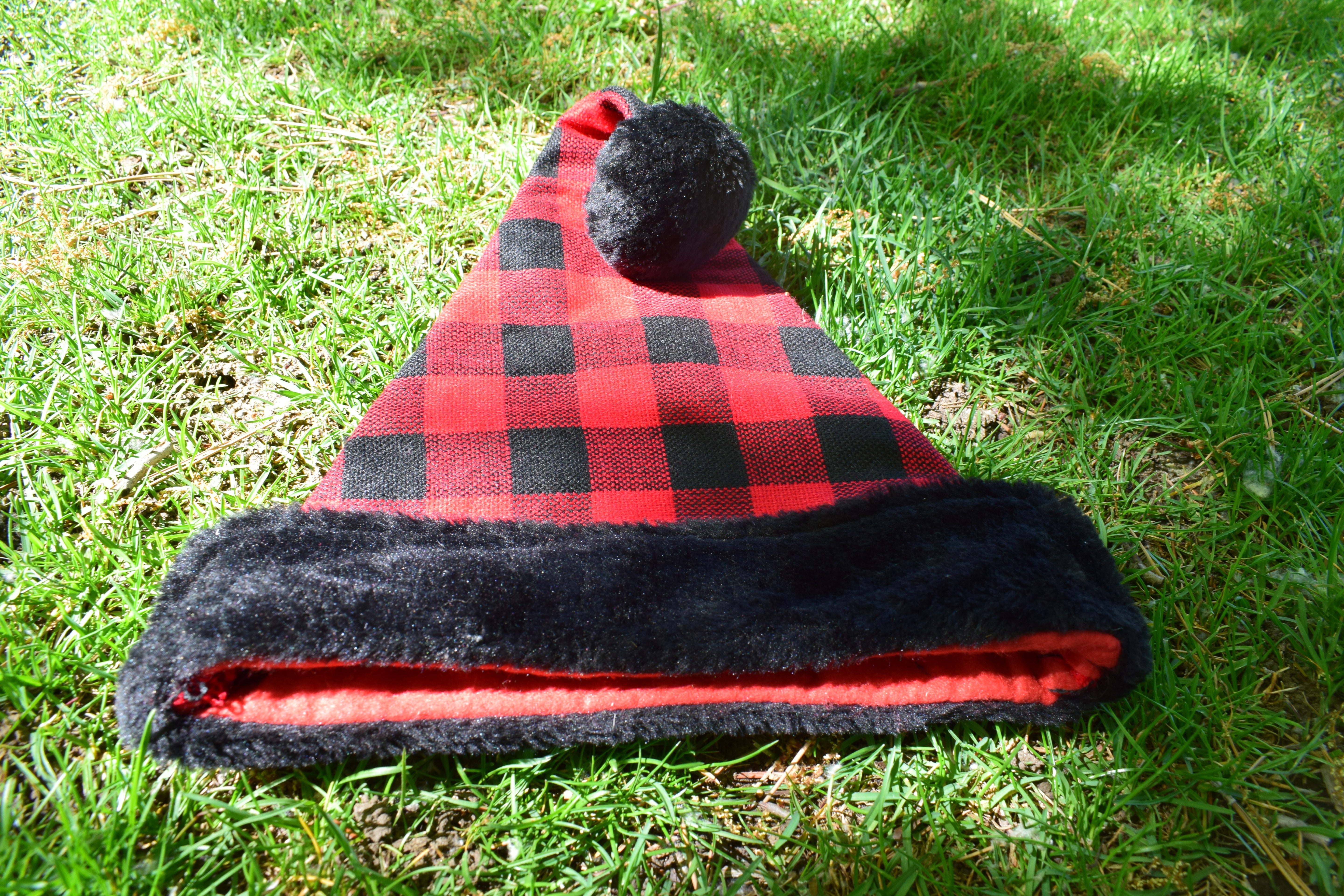 Merry Brite  Red Plaid Santa Hat with black Fluffy Trim Adult Size