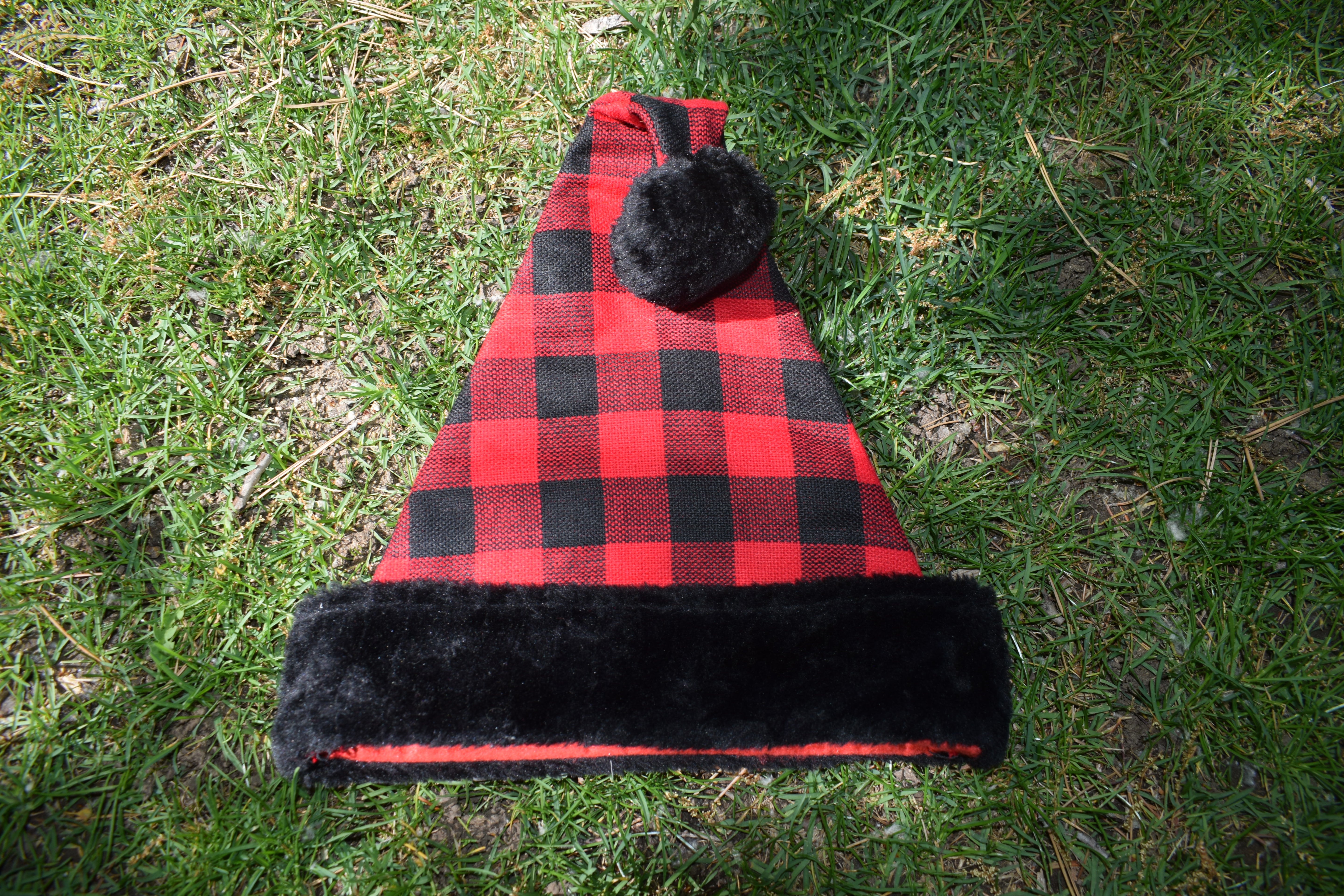 Merry Brite  Red Plaid Santa Hat with black Fluffy Trim Adult Size