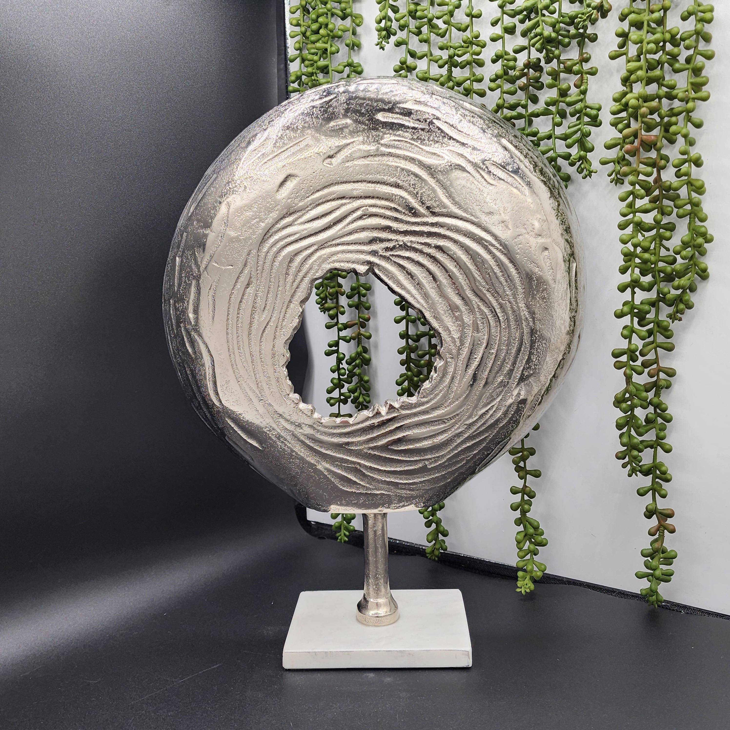 Beautiful Circular Modern Art Piece with White Marble Base with an Impression of the Modern Abyss