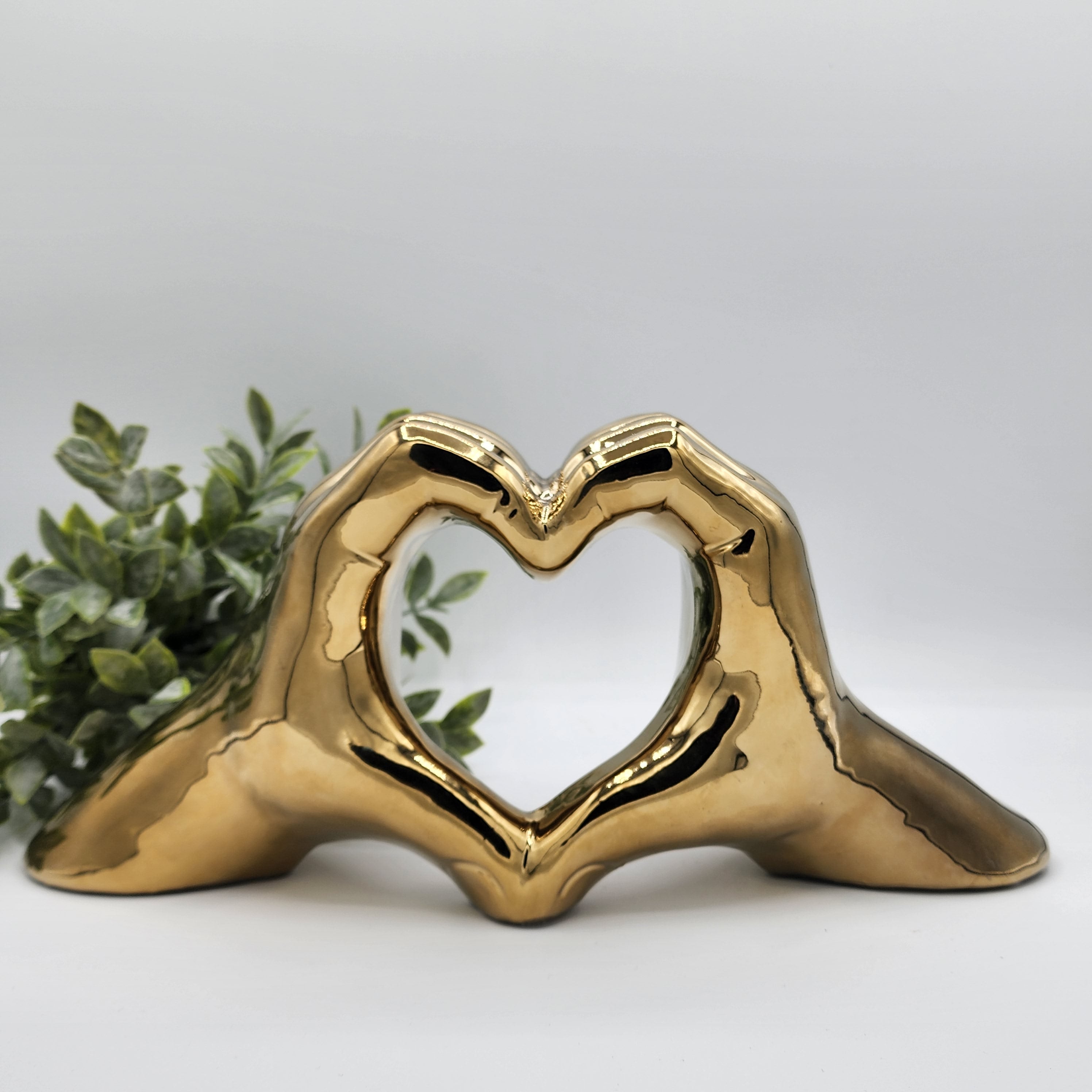 Golden Heart Hands Sculpture