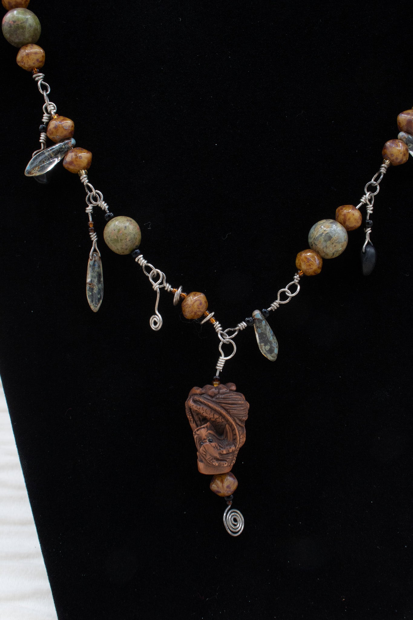 Handmade Irregular Beaded Twisted Metal Necklace with Carved Wood Charm