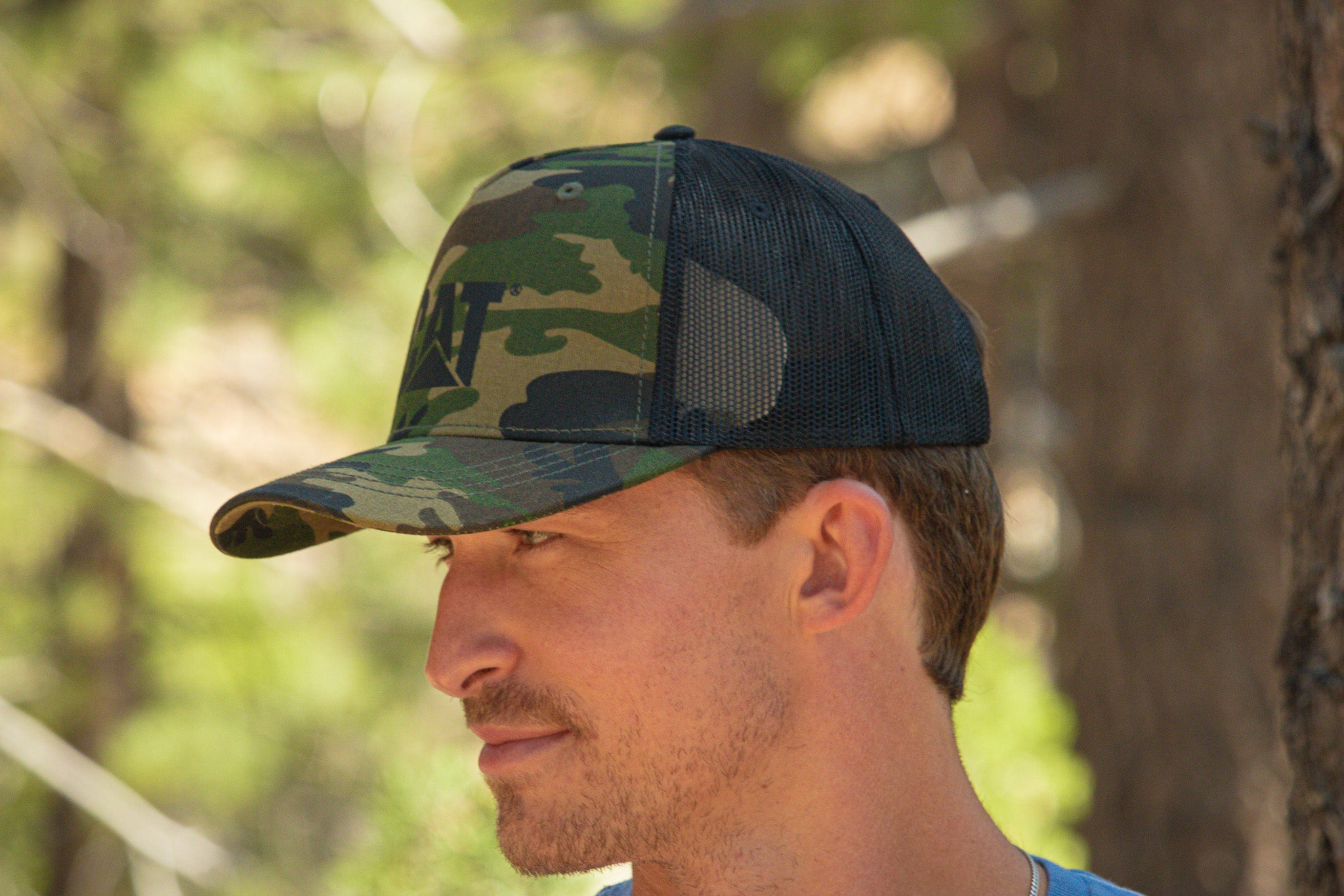 Trucker Cap with Cat Logo Color: Woodland Camo