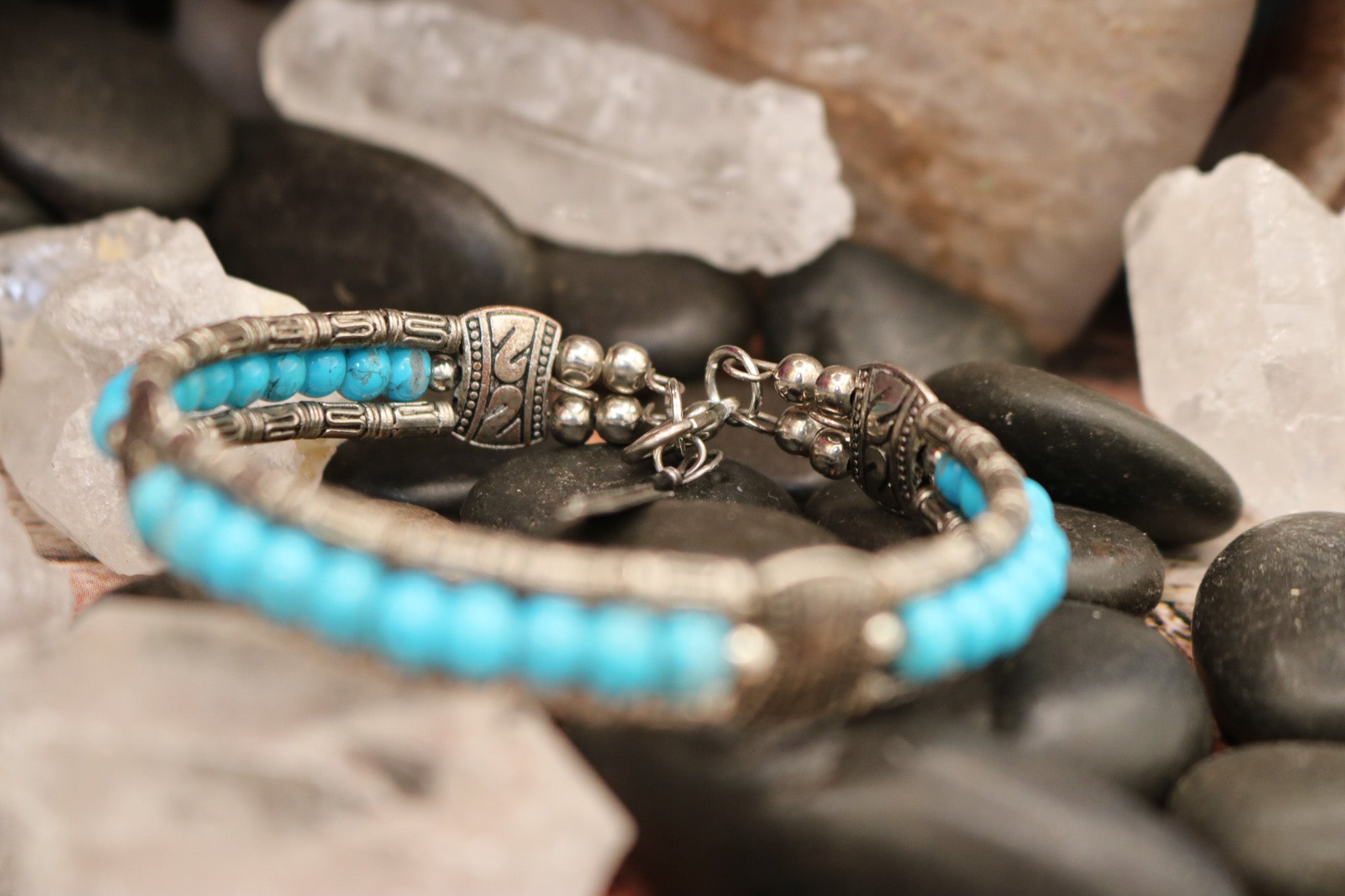 Tibetan Turquoise Colored Gemstone Feather Bracelet