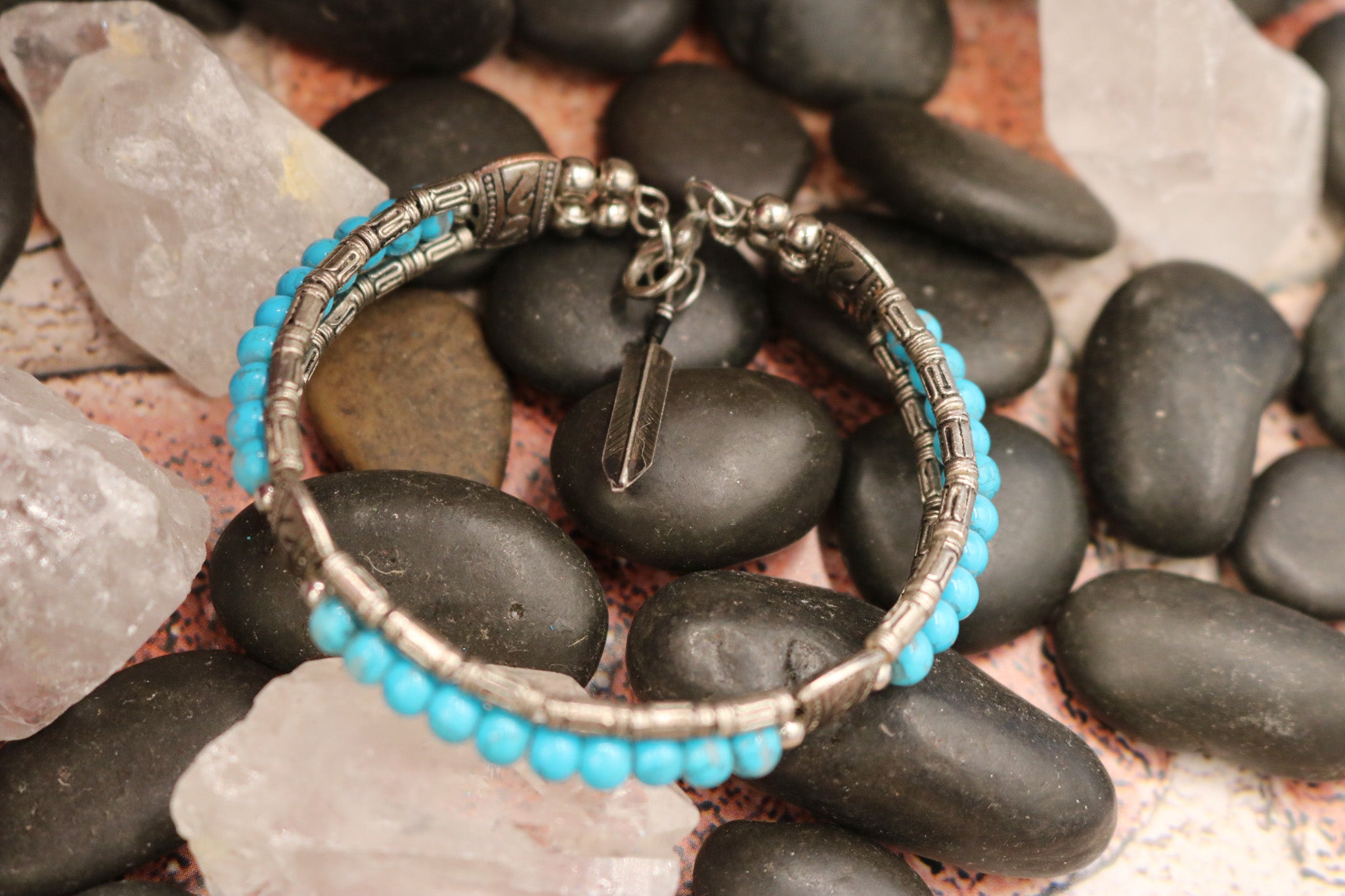 Tibetan Turquoise Colored Gemstone Feather Bracelet