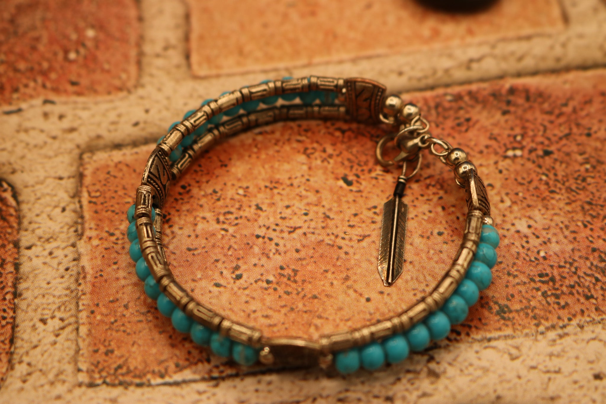 Tibetan Turquoise Colored Gemstone Feather Bracelet