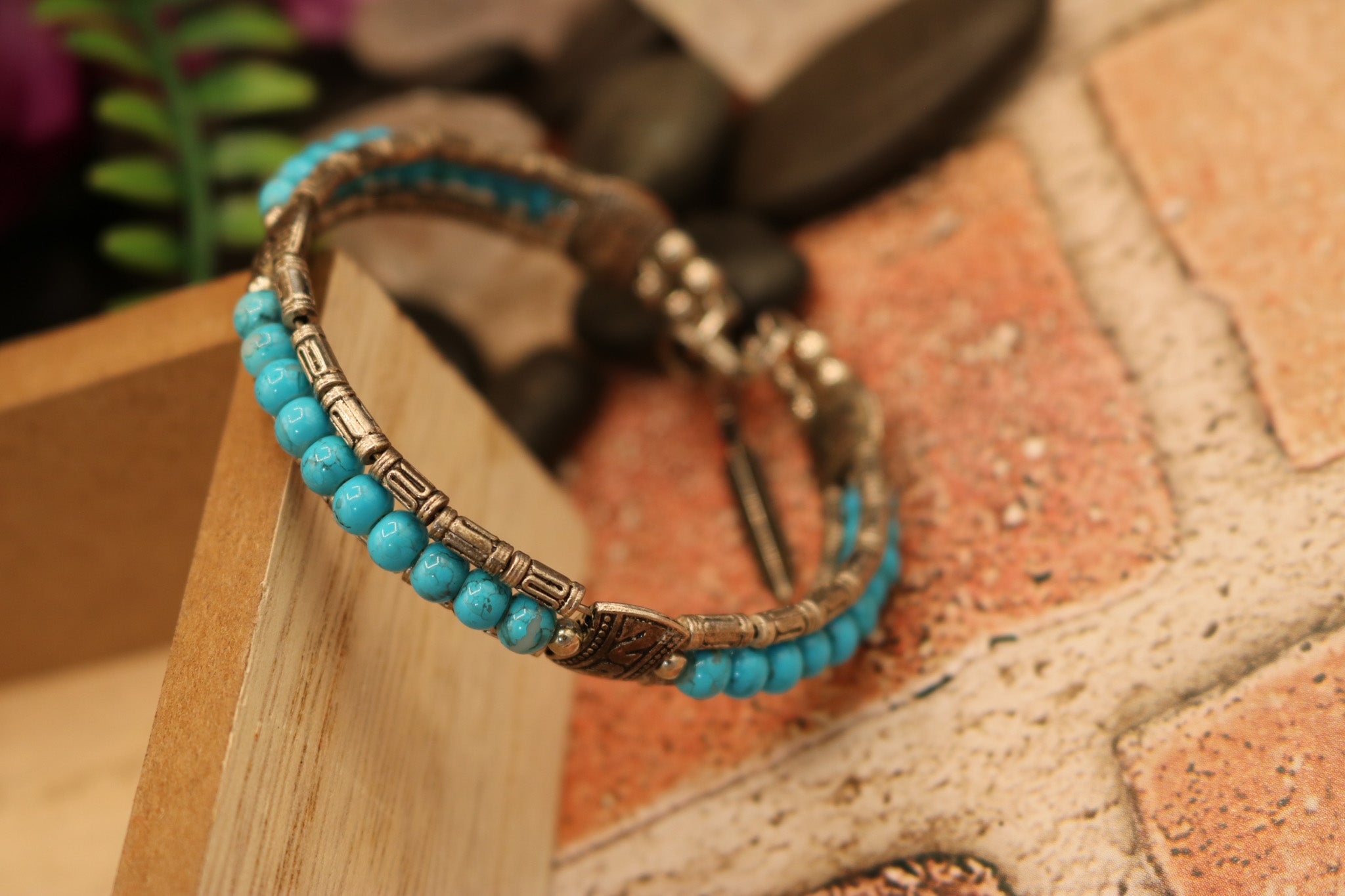 Tibetan Turquoise Colored Gemstone Feather Bracelet