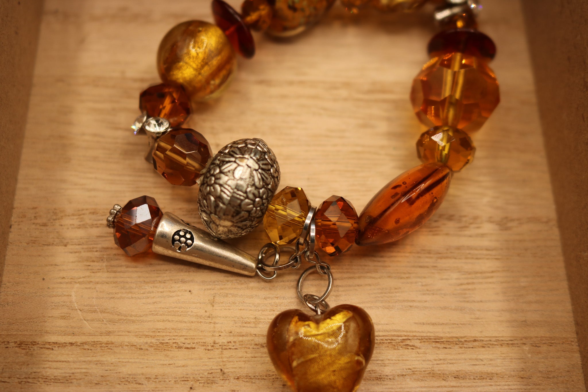 Chunky Stretchy Amber Colored Plastic Beads with Heart Shaped Charm