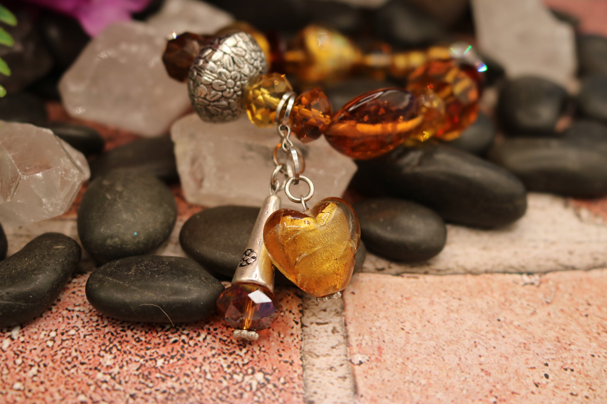 Chunky Stretchy Amber Colored Plastic Beads with Heart Shaped Charm