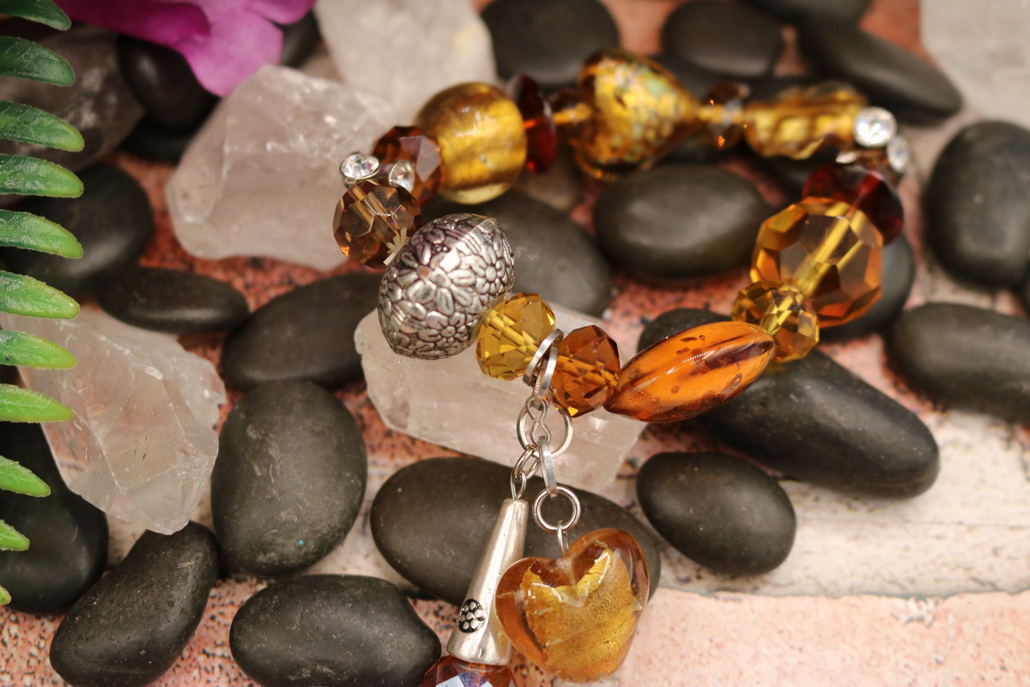 Chunky Stretchy Amber Colored Plastic Beads with Heart Shaped Charm