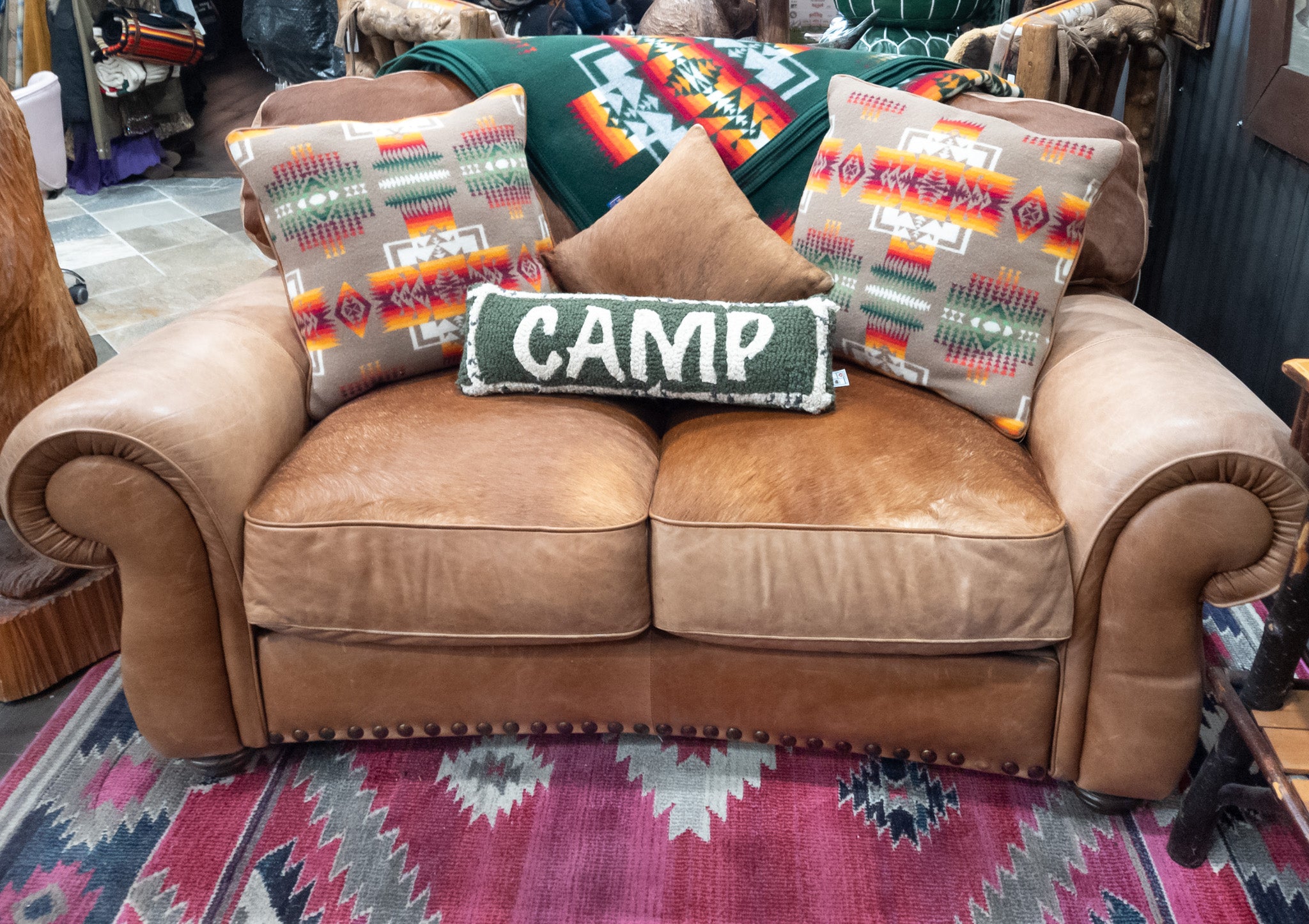 Classic Loveseat Sofa Featuring Custom Cinnamon Cowhide and Leather Upholstery