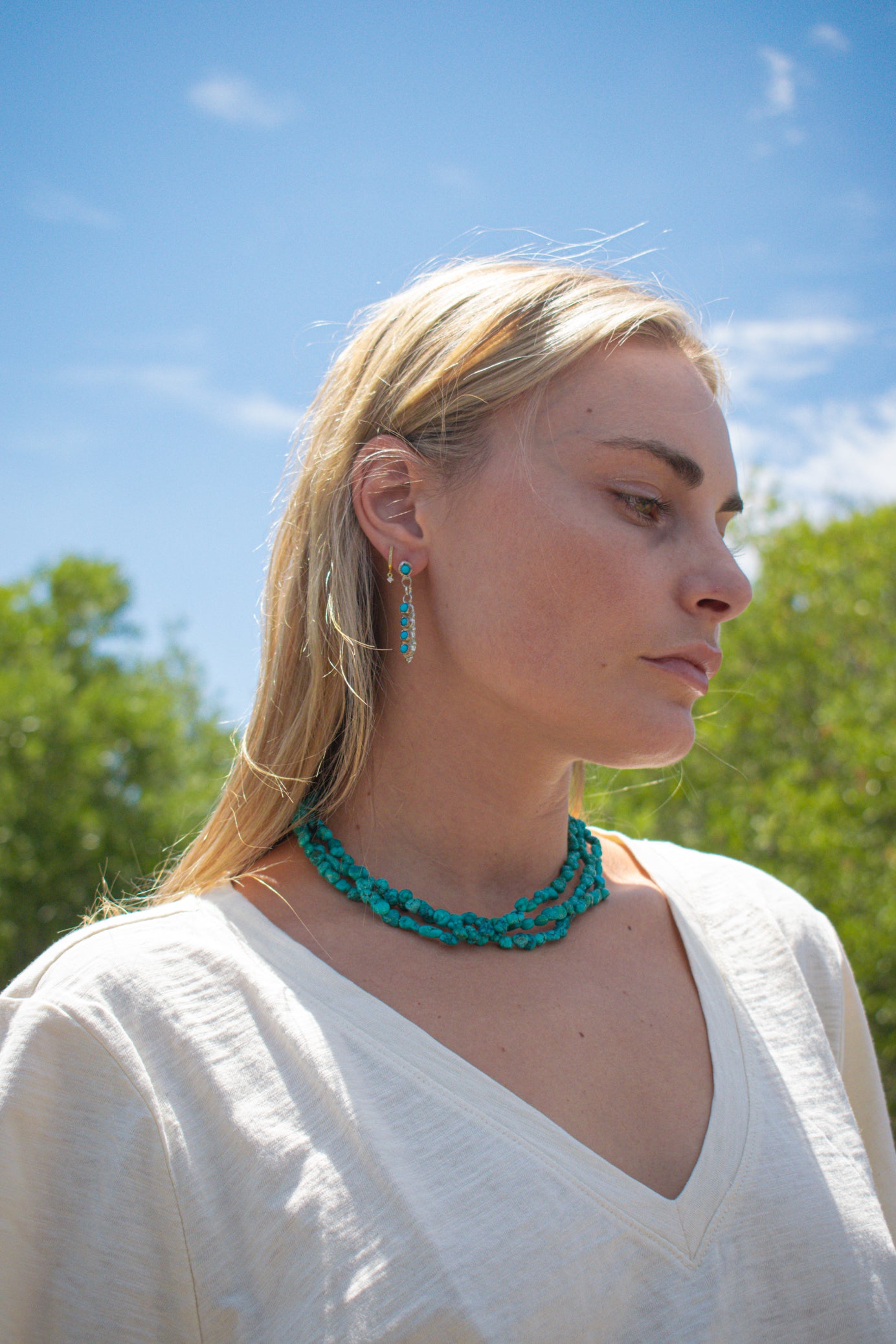 Vintage Navajo Turquoise Nugget Triple Strand Necklace with a Sterling Silver Toggle Clasp.