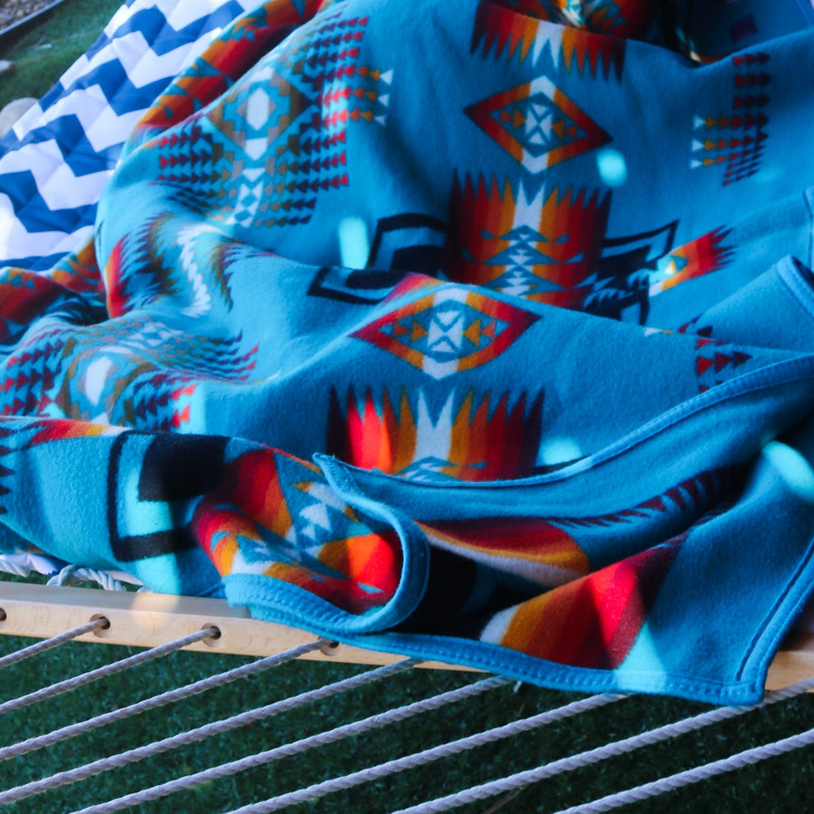 Pendleton Beaver State Blanket Featuring Bold Teal Blue with Warm Reds and Oranges