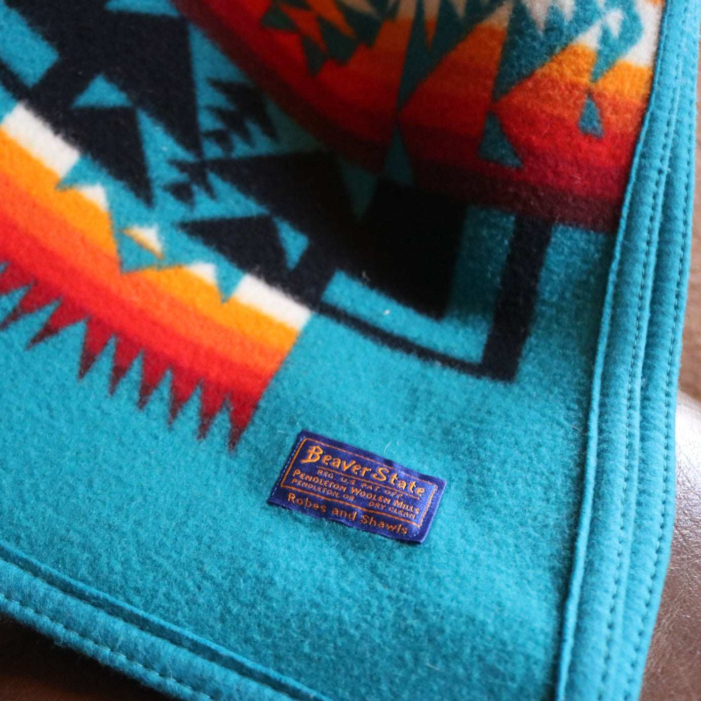 Pendleton Beaver State Blanket Featuring Bold Teal Blue with Warm Reds and Oranges