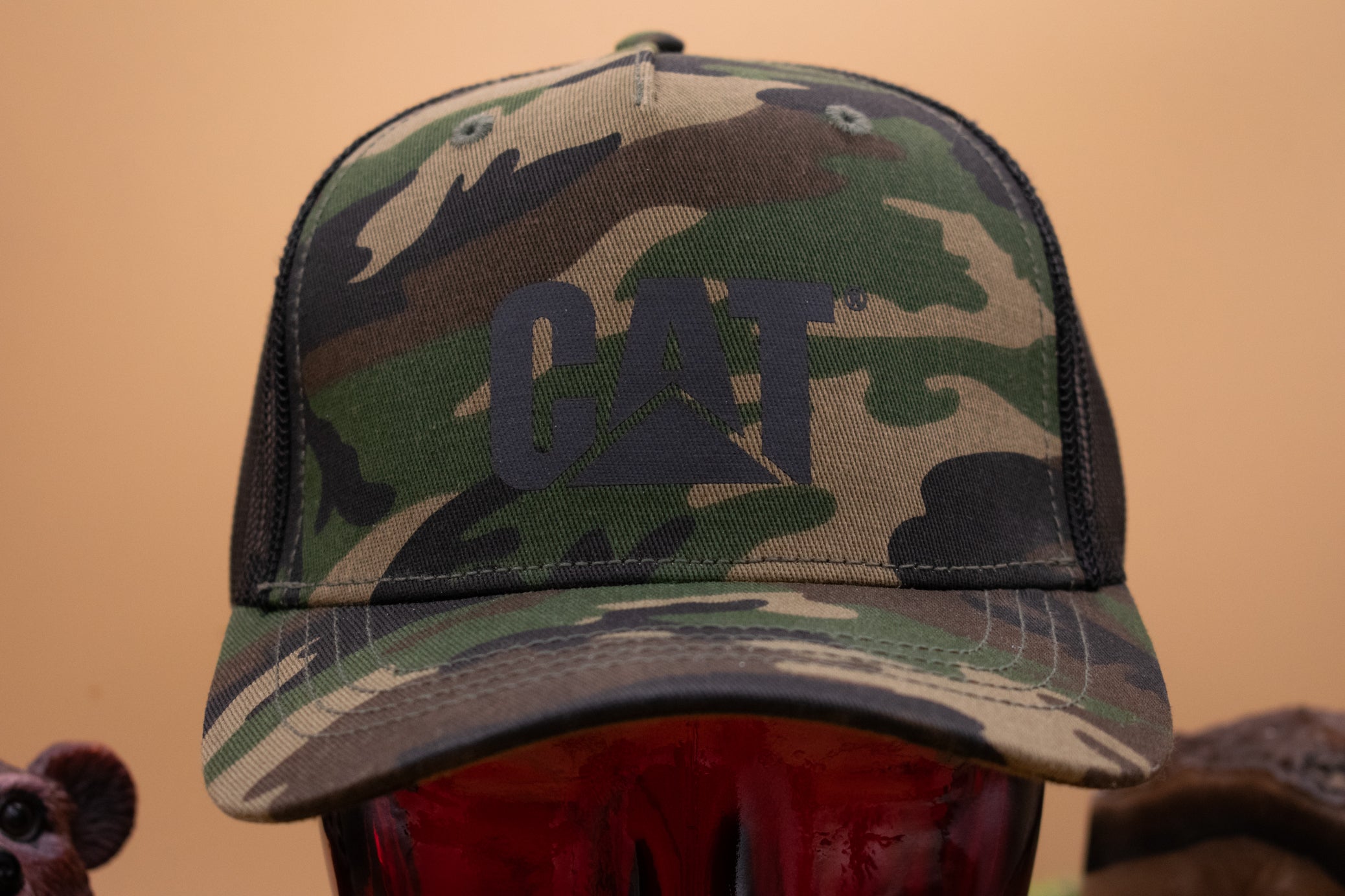 Trucker Cap with Cat Logo Color: Woodland Camo