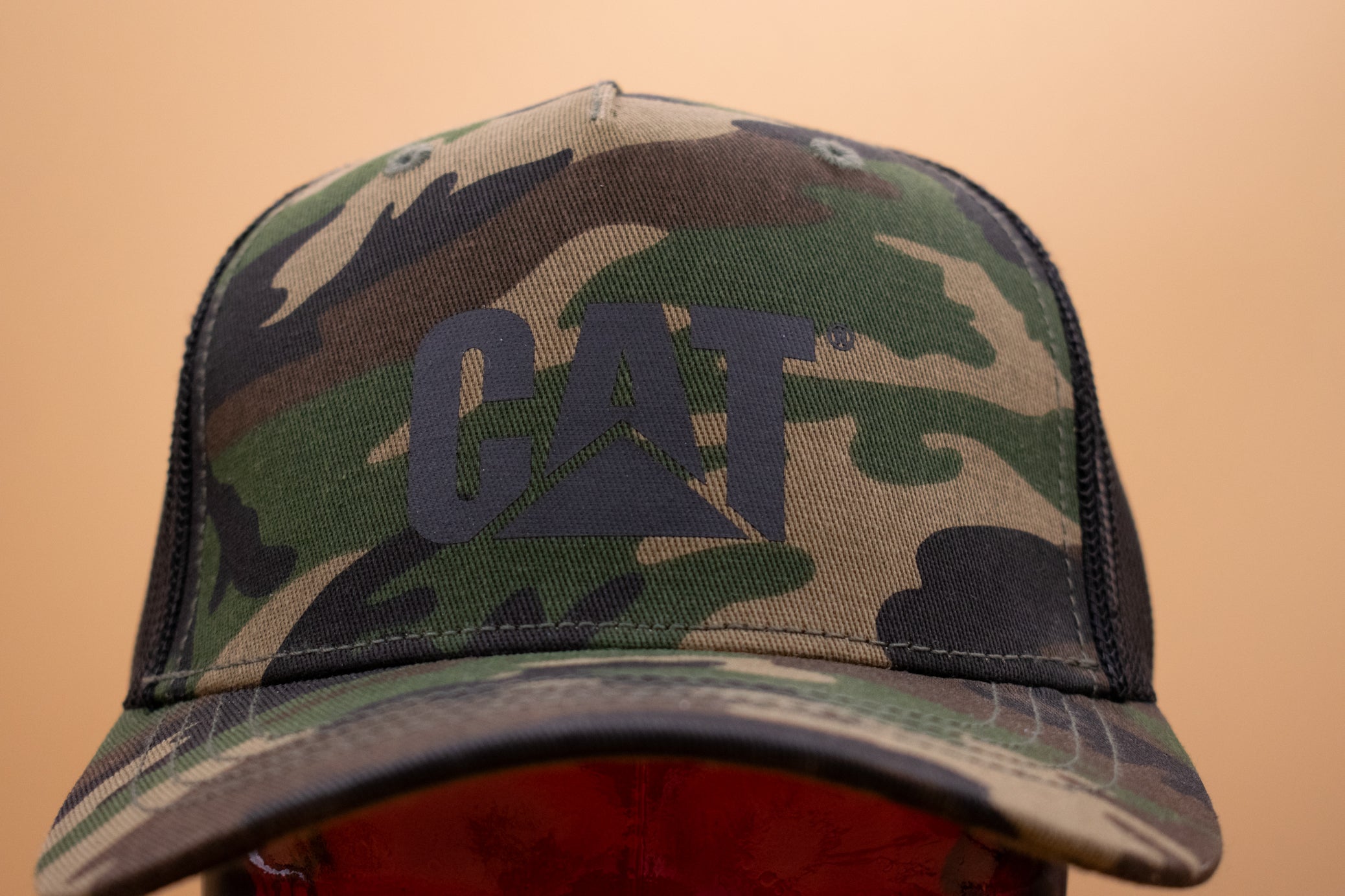 Trucker Cap with Cat Logo Color: Woodland Camo